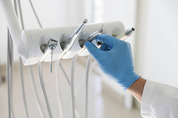 Professional Emergency Dentist technician working in Ferguson, MO